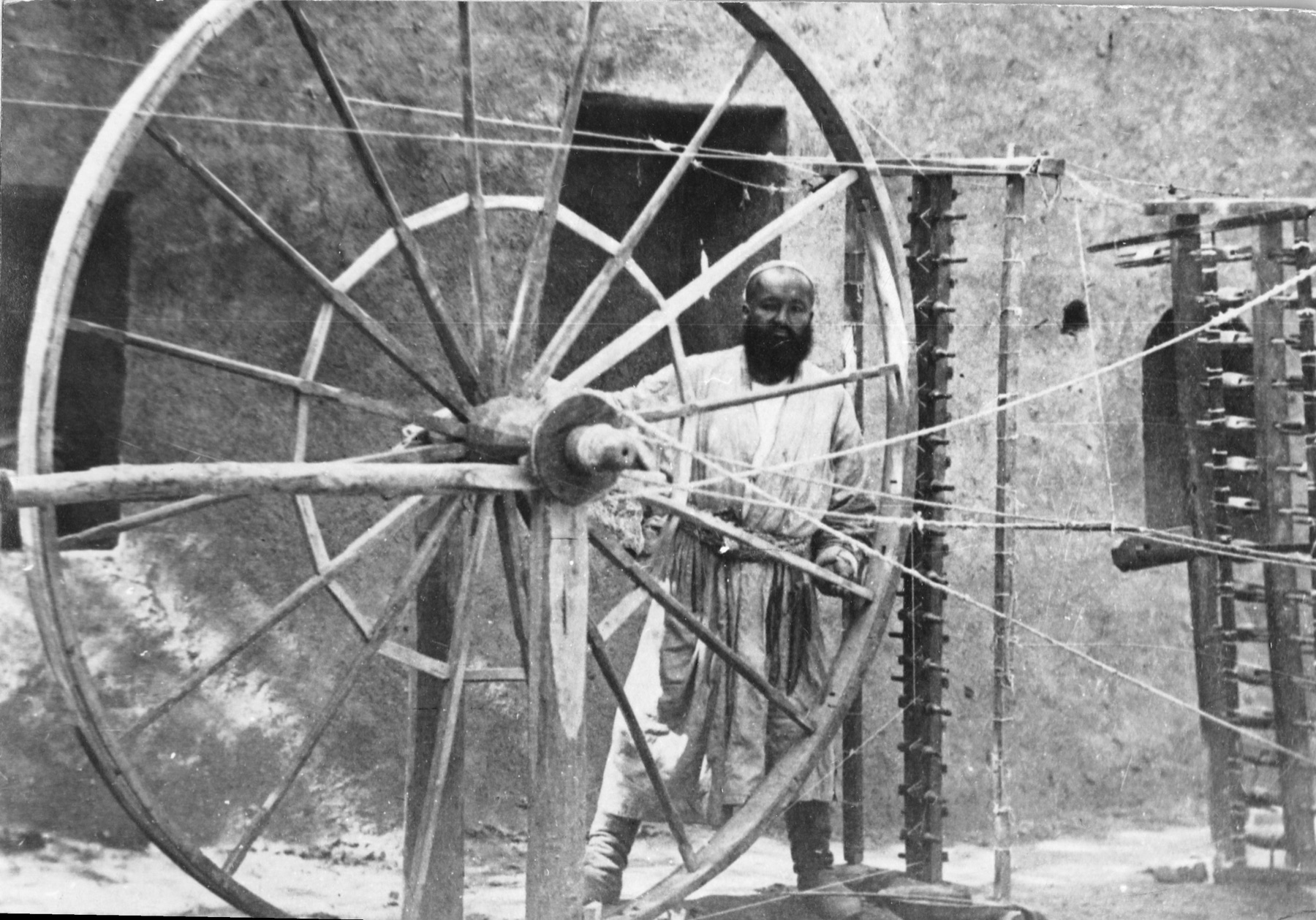 Winding silk from spools onto quills