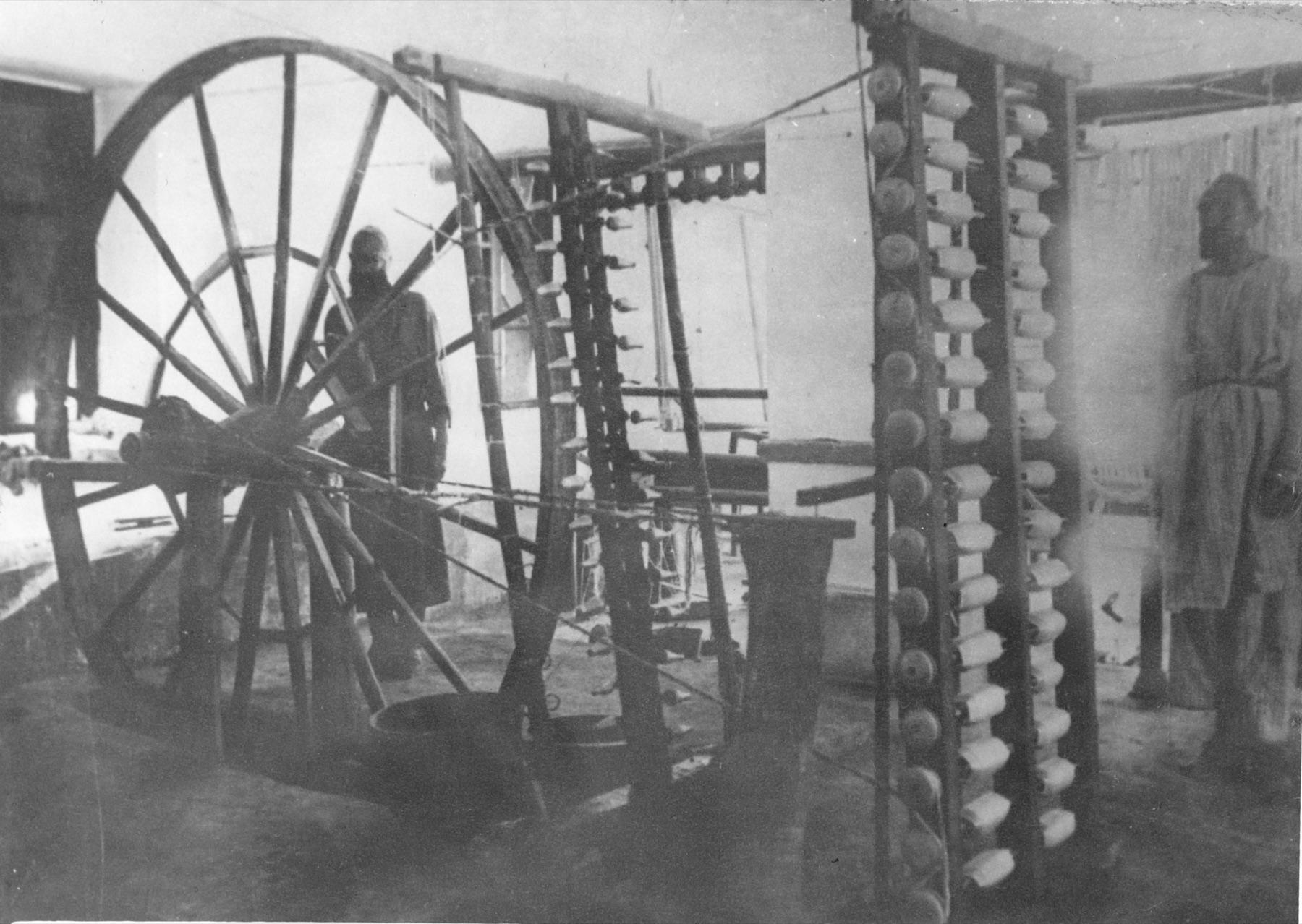 Twisting threads into yarn
